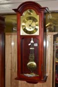A 1980S MAHOGANY FINISH AMS EIGHT DAY WALL CLOCK AND THREE OTHER CLOCKS, the wall clock with brass
