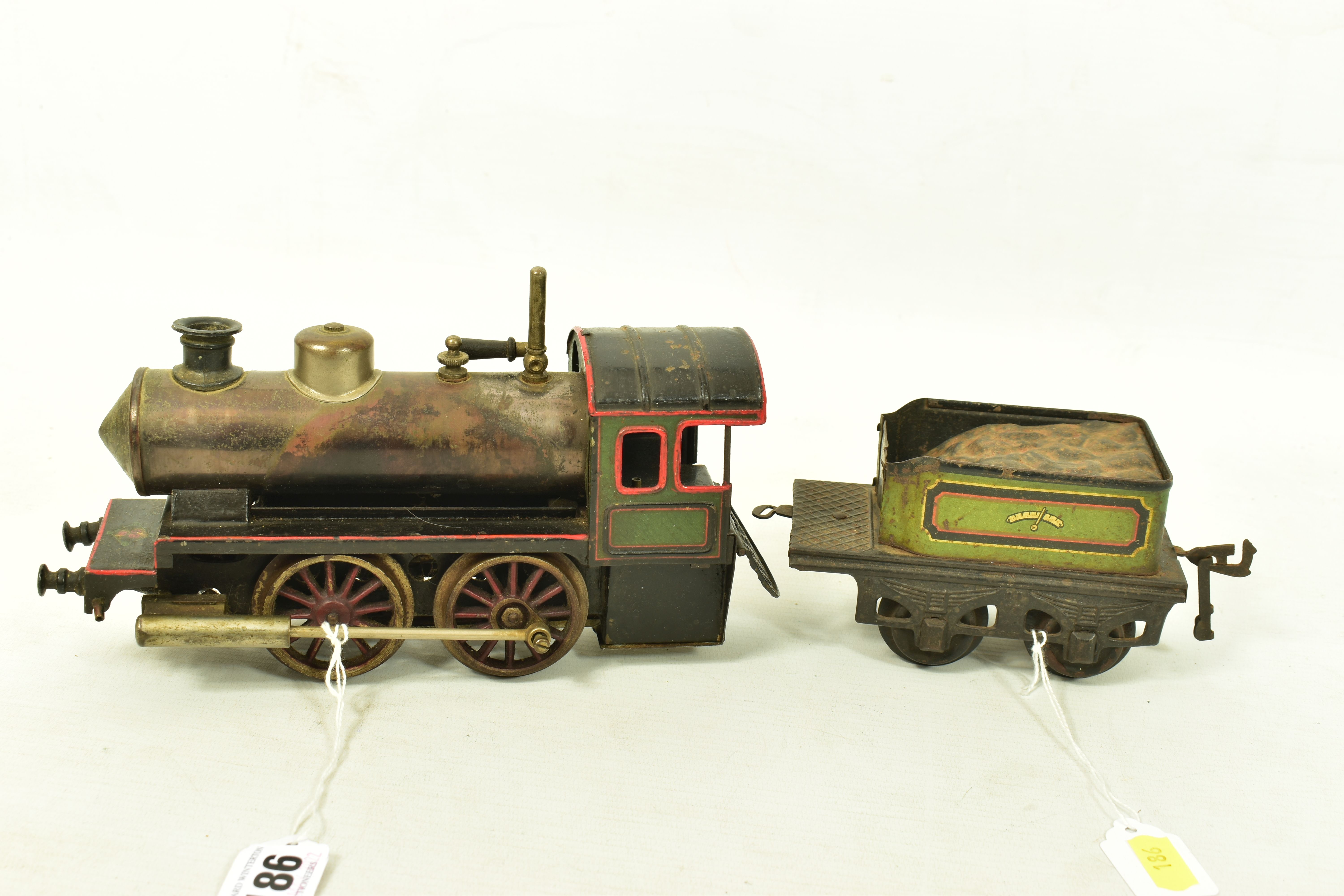 A BING GAUGE 1 LIVE STEAM LOCOMOTIVE AND TENDER, not tested, 0-4-0 locomotive with non-coupled