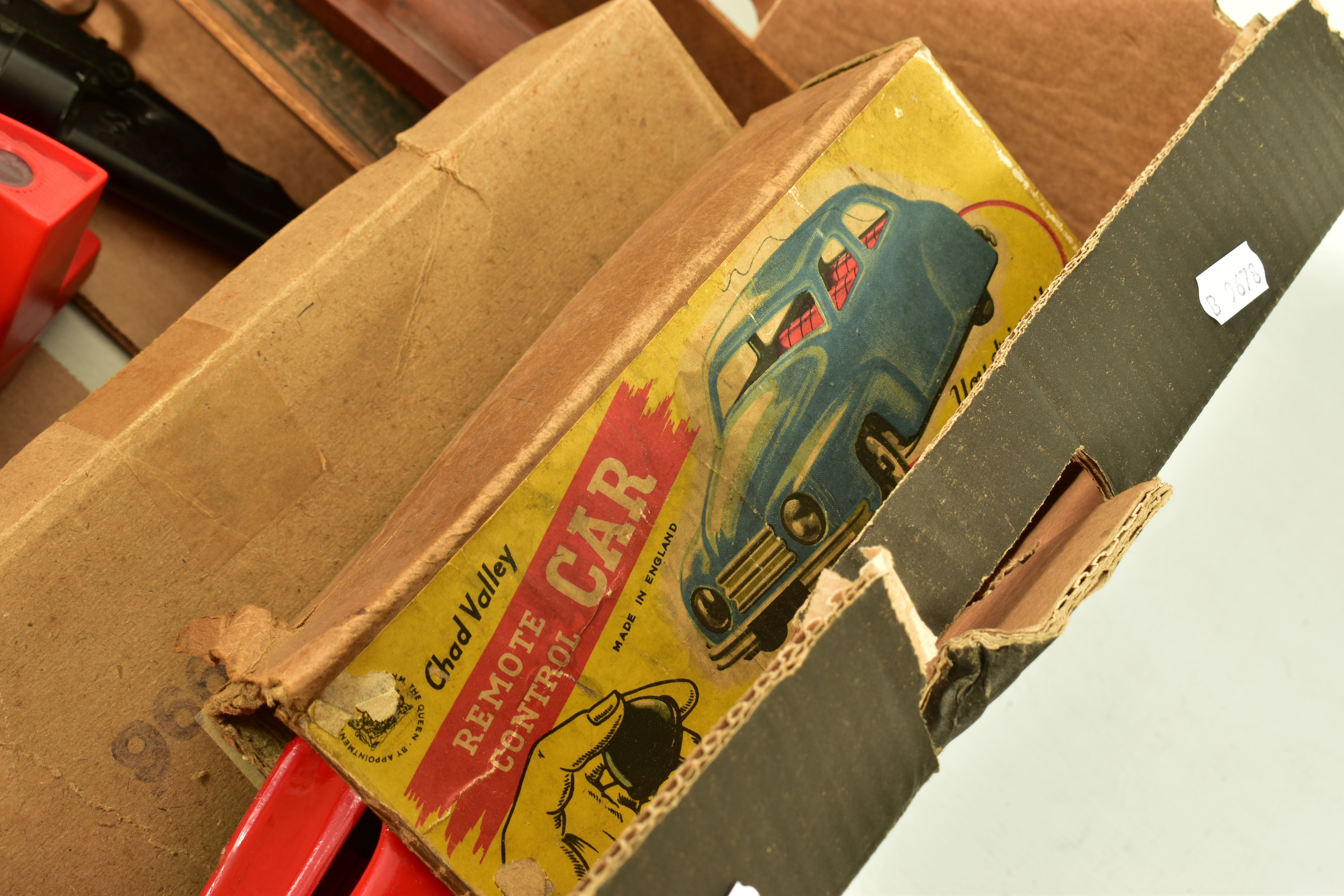 A BOX OF MISCELLANEOUS TOYS, to include a boxed Chad Valley remote controlled car, box very worn - Image 4 of 7