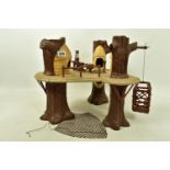 A VINTAGE LFL STAR WARS EWOK VILLAGE PLAYSET 1983, a suspended platform by three trees, with movable