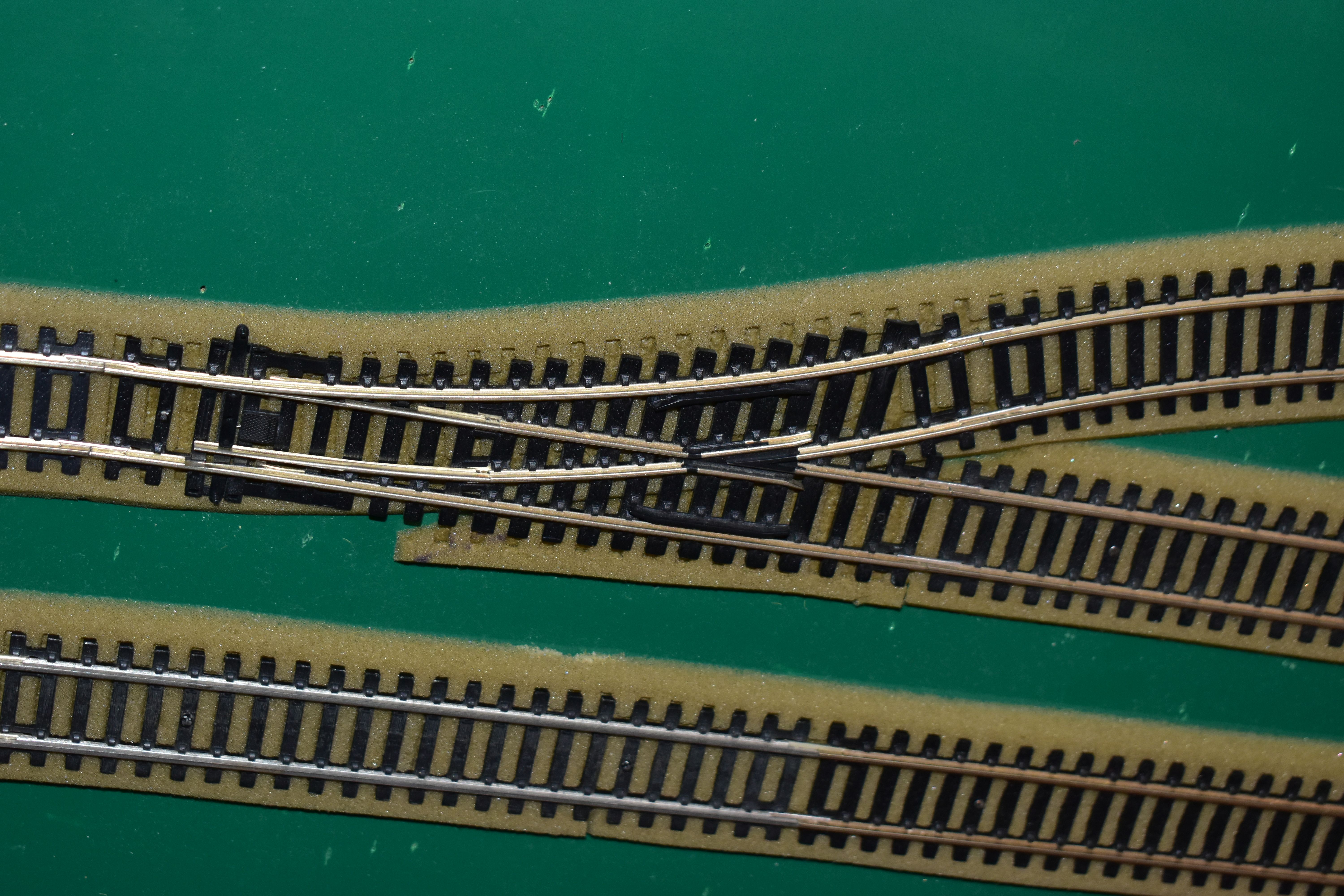 A OO GAUGE MODEL RAILWAY LAYOUT, double oval of track, with a long branch line and four sidings (two - Image 3 of 5