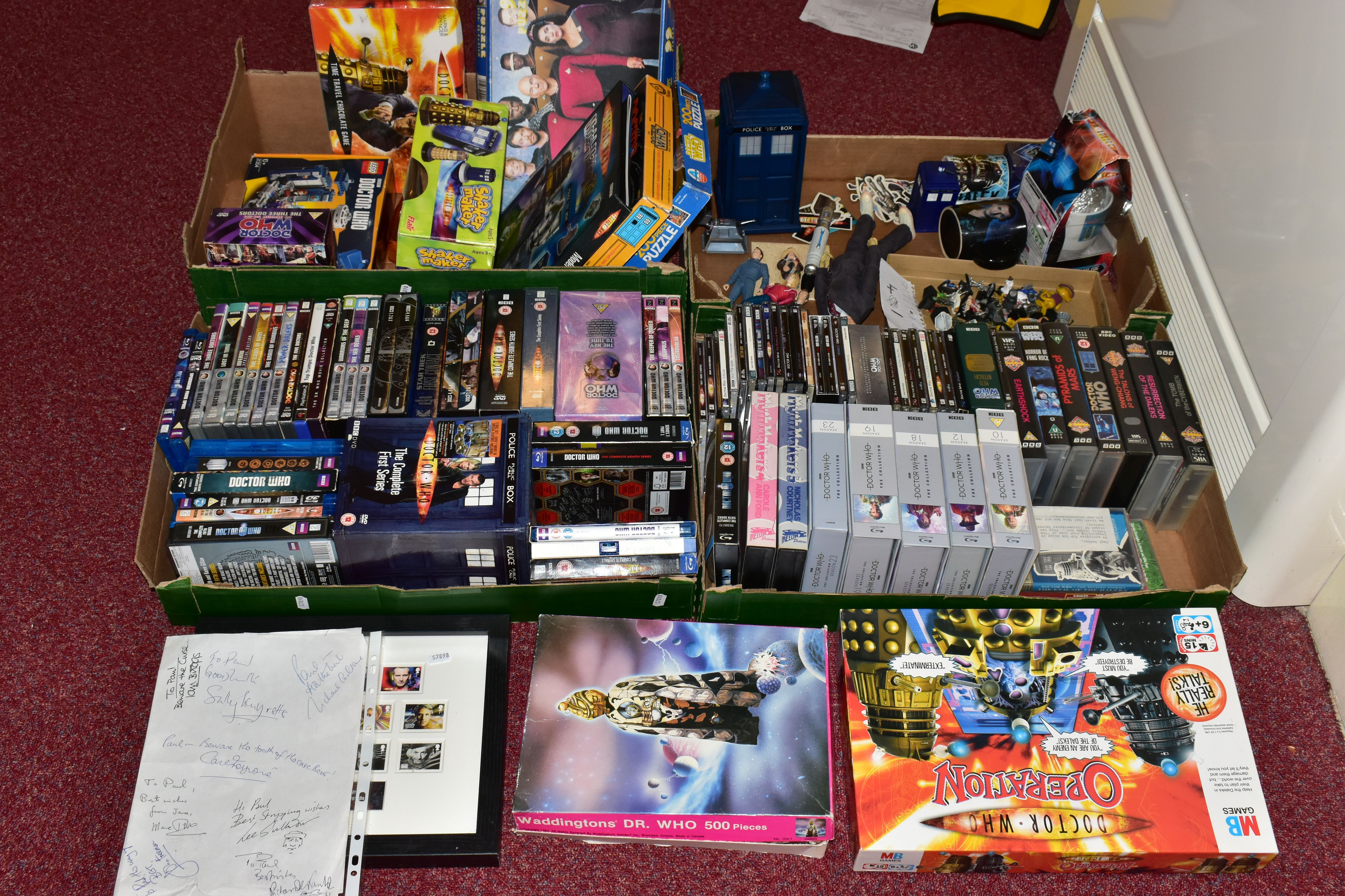 A COLLECTION OF ASSORTED DOCTOR WHO MEMORABILIA, GAMES, VIDEOS AND DVD'S ETC., to include assorted