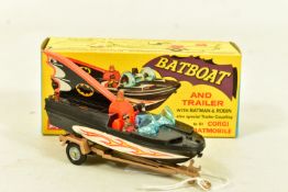 A BOXED CORGI TOYS BATBOAT AND TRAILER, no. 107, Batman and Robin present, black boat with, flame