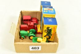FOUR BOXED MATCHBOX HEAVY MACHINERY AND AGRICULTURAL MODEL VEHICLES, comprising of a Snow-Trac,