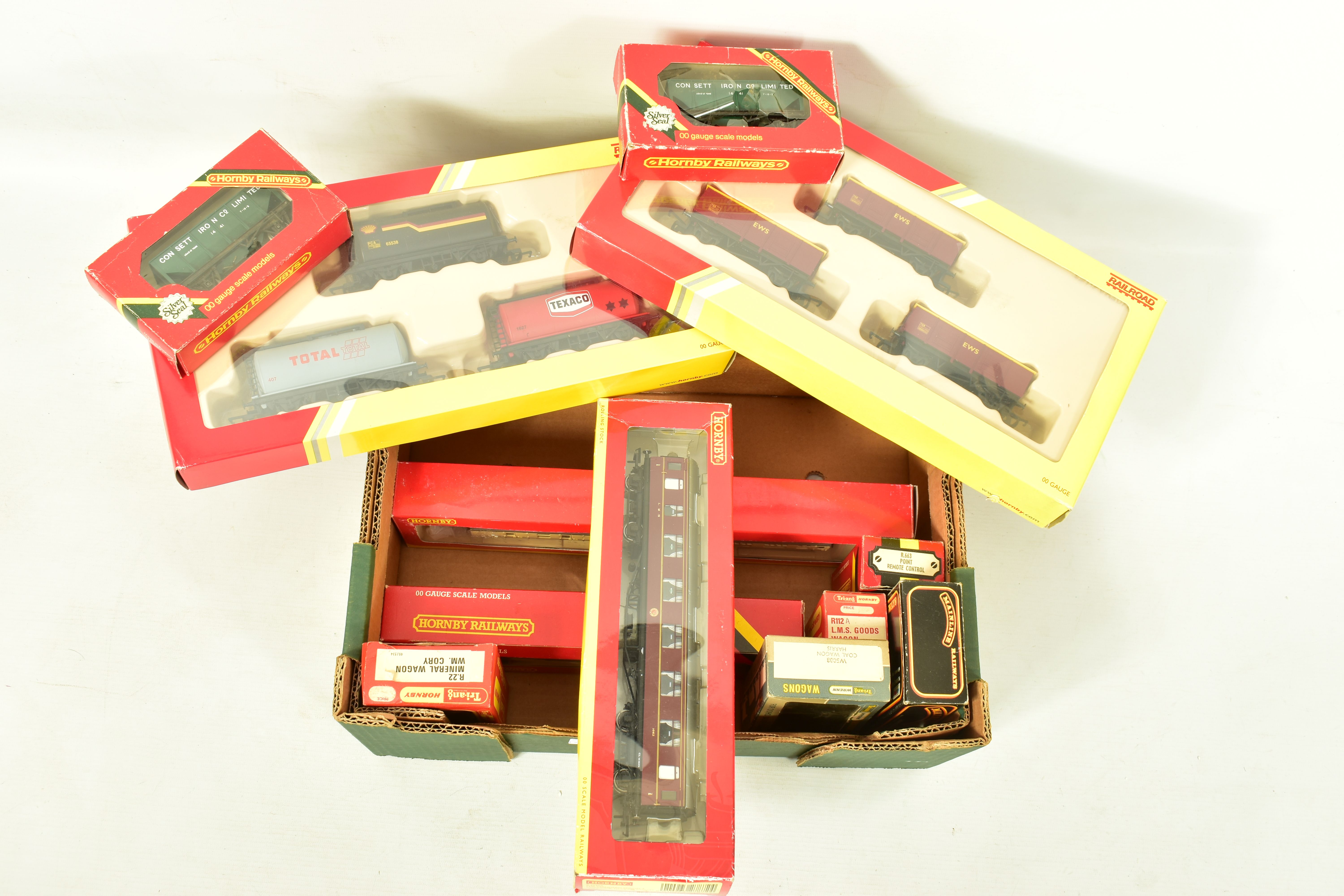 A QUANTITY OF BOXED ASSORTED OO GAUGE MODEL RAILWAY ROLLING STOCK, to include Tri-ang Wrenn,