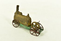 A TINPLATE FLOOR LOCOMOTIVE, no makers marks, gold boiler, green chassis and red wheels, evidence of