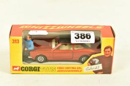 A BOXED CORGI TOYS FORD CORTINA GXL, No.313, metallic bronze body, with Graham Hill figure, very