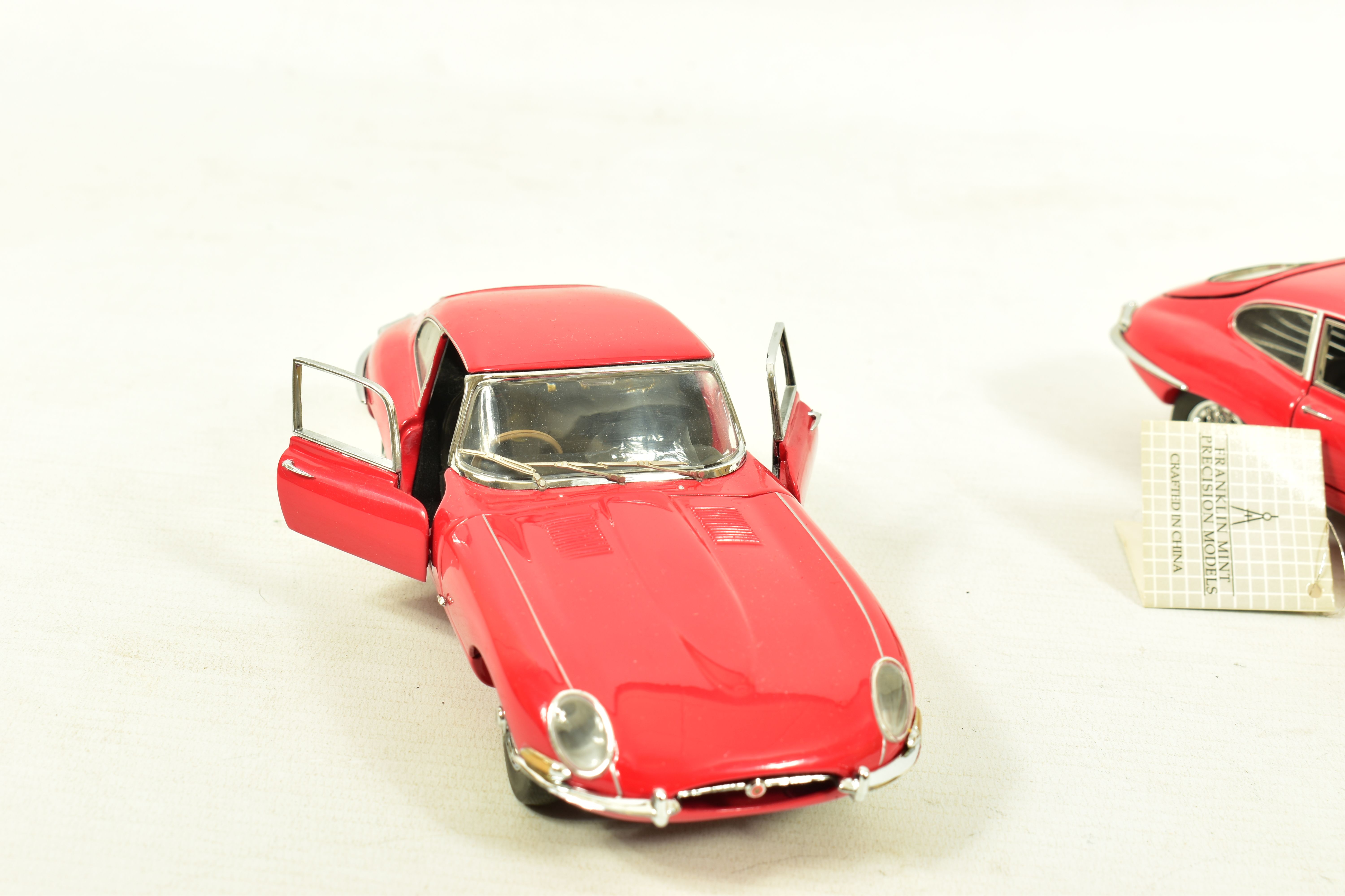 TWO BOXED FRANKLIN MINT 1961 JAGUAR E-TYPE COUPE, 1/24 scale both in red and complete with swing - Image 2 of 6