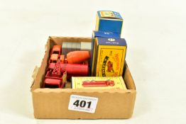 FOUR BOXED MATCHBOX HEAVY MACHINERY VEHICLES, comprising of a Wreck Truck, no. 13, painted red