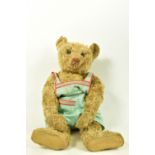 A LARGE STEIFF BLOND PLUSH TEDDY BEAR, 1920's/1930's style button with the long trailing f to left