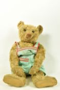 A LARGE STEIFF BLOND PLUSH TEDDY BEAR, 1920's/1930's style button with the long trailing f to left
