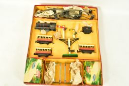 A BOXED BRIMTOY O GAUGE CLOCKWORK TRAIN SET, has 8/8 stamped on lid, locomotive and tender No.67040,