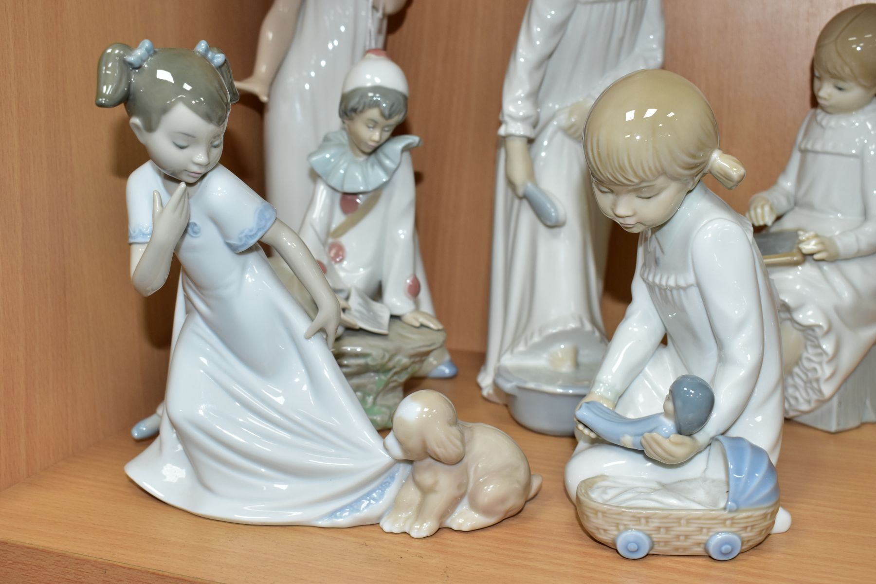 EIGHT NAO PORCELAIN FIGURES OF CHILDREN AND ANIMALS, including a girl in a nightdress covering a - Image 3 of 7