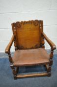 AN OAK SINGLE MONKS CHAIR, with an adjustable pierced back, open arm rests, on turned supports,