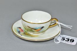 A ROYAL WORCESTER MINIATURE CUP AND SAUCER, the ivory ground painted with a Redstart to the cup