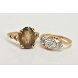 TWO 9CT GOLD RINGS, an oval cut stone assessed as Smokey quartz, prong set in a yellow gold, leading