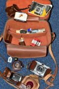 A CAMERA BAG CONTAINING A KODAK RETINETTE FILM CAMERA, a Sun tele converter, Voigtander Rangefinder,