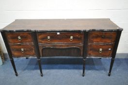 A REGENCY STYLE FLAME MAHOGANY SIDEBOARD, with two drawers flanked by two cupboard doors, with brass