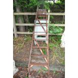 A PAIR OF WOODEN STEP LADDERS 220cm high and three folding painted wooden garden chairs