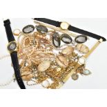 A BAG OF ASSORTED COSTUME JEWELLERY, to include two hardstone panel necklaces each set within a