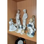 EIGHT NAO PORCELAIN FIGURES OF CHILDREN AND ANIMALS, including a girl in a nightdress covering a