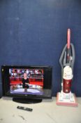 A SANYO CE32LD47-B 32in TV and remote and a Hoover Alyx upright vacuum cleaner (pipe split) (both