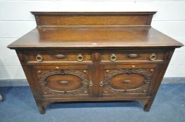 AN EARLY TO MID 20TH CENTURY OAK SIDEBOARD, with a raised back, and two drawers over two cupboard
