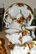 A TWENTY TWO PIECE ROYAL ALBERT OLD COUNTRY ROSES TEA SET, comprising a handled cake plate, a