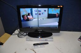 A SAMSUNG LE26A456C2DXXU 26in TV with remote and Daewoo DVD player with remote (both PAT pass and