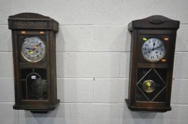 TWO EARLY TO MID 20TH CENTURY OAK WALL CLOCKS (two winding keys and pendulum) (case in fair to