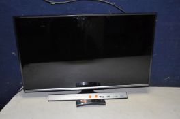 A SAMSUNG T32E310EX 32in tv with remote (PAT pass and working)