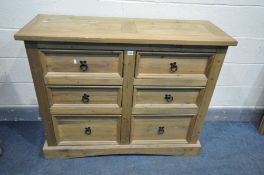 A MODERN CORONA PINE SIDEBOARD/CHEST OF DRAWERS, with six various drawers, length 120cm x depth 43cm