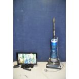 A POLAROID P19LEDDVD 19in TV with remote and a Hoover Blaze vacuum cleaner (both PAT pass and