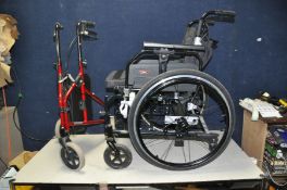 A DRIVE MOBILITY ENIGMA WHEELCHAIR and a travelator (2)