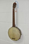 A VINTAGE BANJO, open backed, with a metal body and mother of pearl inlaid neck, approximate
