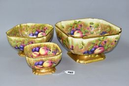 AN AYNSLEY ORCHARD GOLD GRADUATED SET OF THREE SHAPED SQUARE PEDESTAL BOWLS, ribbed gilt top rim and