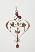 AN AF EDWARDIAN GARNET AND SEED PEARL PENDANT, of an openwork heart design, set with oval cut