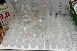 A QUANTITY OF CUT CRYSTAL AND OTHER GLASSWARES, to include three decanters, three large vases