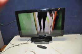 A PHILIPS 32PFL3606H 32in TV with remote and a Digihome DVD player (draw sticks) (both PAT pass