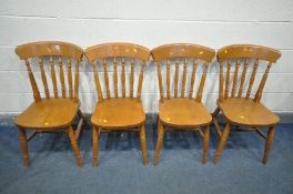 A SET OF FOUR BEECH KITCHEN CHAIRS (condition:-surface scratches to seat)