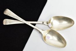 TWO SILVER SERVING SPOONS, old English pattern design with engraved crests to the terminals, each