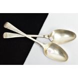 TWO SILVER SERVING SPOONS, old English pattern design with engraved crests to the terminals, each