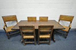 A MID 20TH CENTURY OAK TRESTLE REFRECTORY TABLE WITH A SINGLE STRETCHER, along with six oak framed