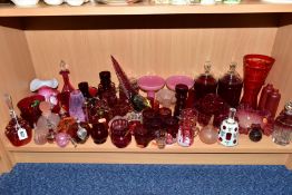 A COLLECTION OF 19TH AND 20TH CENTURY COLOURED GLASSWARE, MOSTLY CRANBERRY AND RUBY, includes a