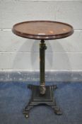 A 19TH CENTURY TELESCOPIC SIDE TABLE, the circular mahogany top with a gallery edge, on a brass