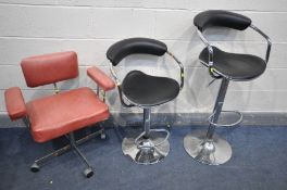 A PAIR OF BLACK LEATHERETTE RISE AND FALL CHROME STOOLS, and a Ryman Conran red leather industrial