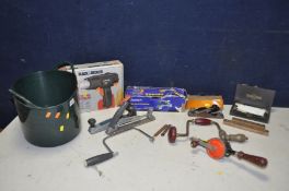 A COLLECTION OF TOOLS to include a bucket of hand tools, saws, hand drill, hand screwdrivers, two