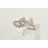AN 18CT GOLD DIAMOND SOLITAIRE RING, a round brilliant cut diamond in a four prong white gold