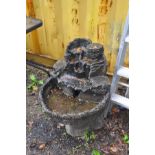 A MODERN COMPOSITE BIRD BATH/FOUNTAIN in the form of a hollowed out tree trunk (no pump) height