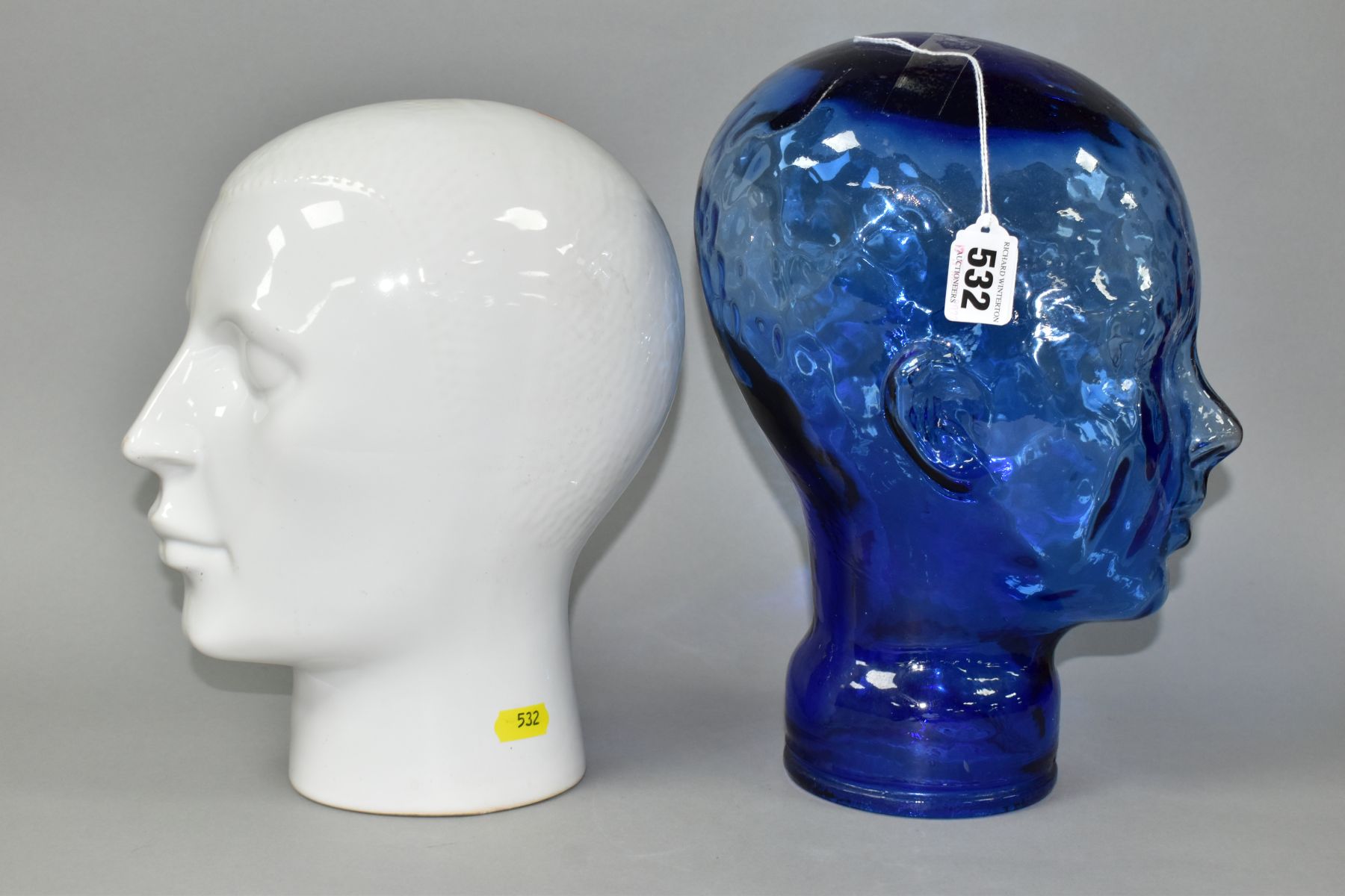 TWO DECORATIVE DISPLAY HEADS IN BLUE GLASS AND WHITE GLAZED CERAMIC, heights 30cm and 27cm (2) ( - Image 4 of 5